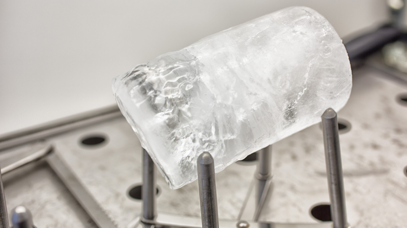 An ice core being analyzed for plastic.